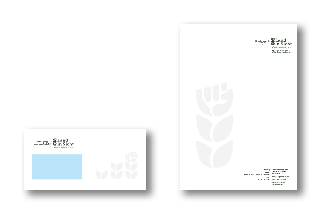 A mock-up of stationery for Land in Sicht. On the left side is an envelope and on the right side is the letterhead of Land in Sicht.